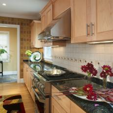 Updated Kitchen Boasts Light Cabinets & Tile Backsplash