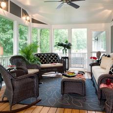 Lovely Traditional Screened Porch With Wicker Furnishings
