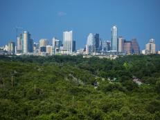Austin Texas Skyline Mid Day blue sky with Greenbelt