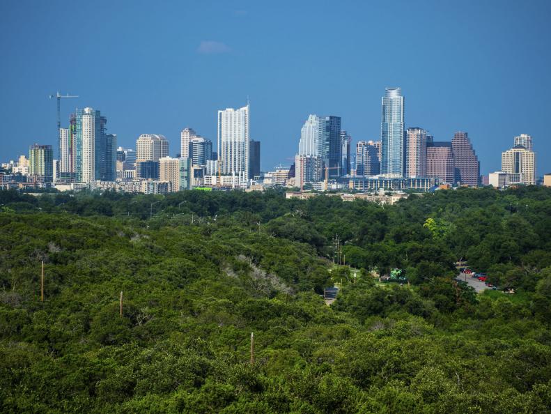 Austin Texas Skyline Mid Day blue sky with Greenbelt