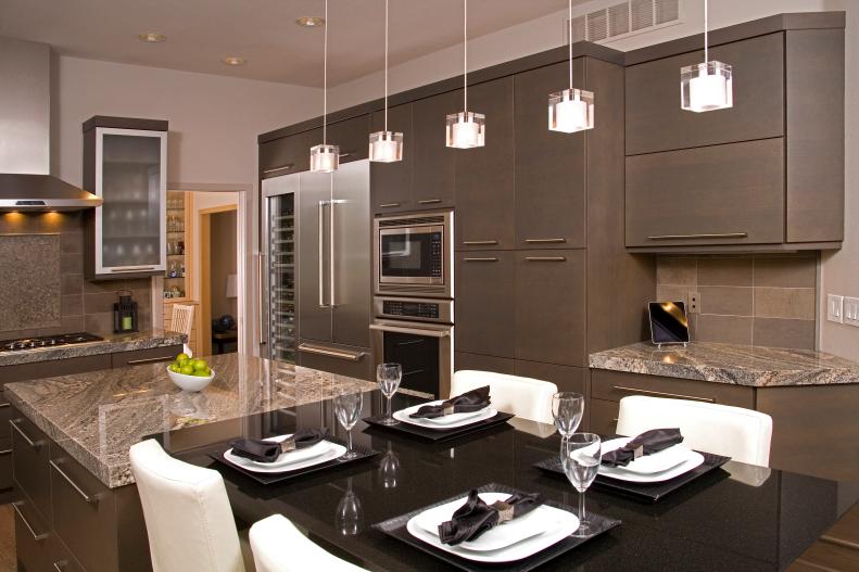 Contemporary Gray Kitchen With Small Pendants and Black Dining Table