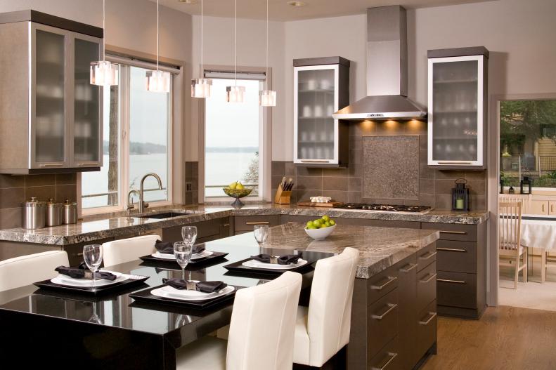 Contemporary Kitchen With Gray Island, Pendants & Black Dining Table