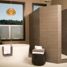 Brown Modern Spa Bathroom With White Tub