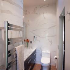 White Marble Bathroom With Towel Rack