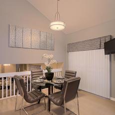 Chic Contemporary Dining Room Features Gray Leather Chairs
