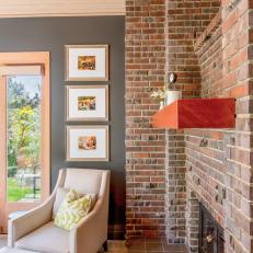 Brick Fireplace and Floating Wood Mantel