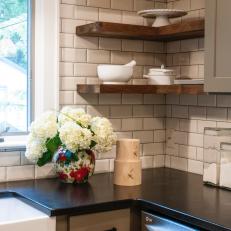 Black Kitchen Countertop and White Subway Tile Backsplash