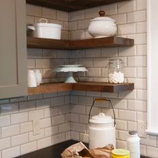 Wood Floating Kitchen Shelves and White Tile Backsplash