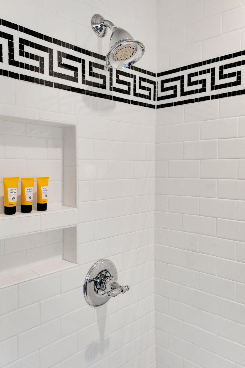 Greek Key Design in White Tile Shower | HGTV