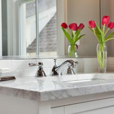 Chrome Faucet & Marble Countertop in Neutral Bathroom