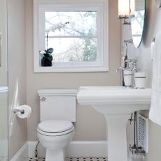 Transitional Bathroom Boasts Retro Black & White Tile Floor