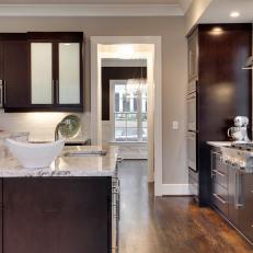 Transitional Kitchen Features Rich Brown Cabinetry