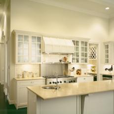 White Cottage Kitchen With White Range Hood