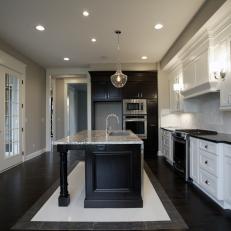 Elegant Gray Kitchen Features Black & White Cabinetry