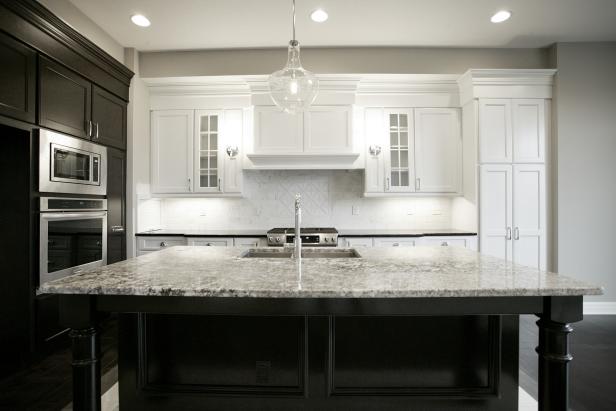 Sophisticated Gray Kitchen Features Black & White Cabinets ...