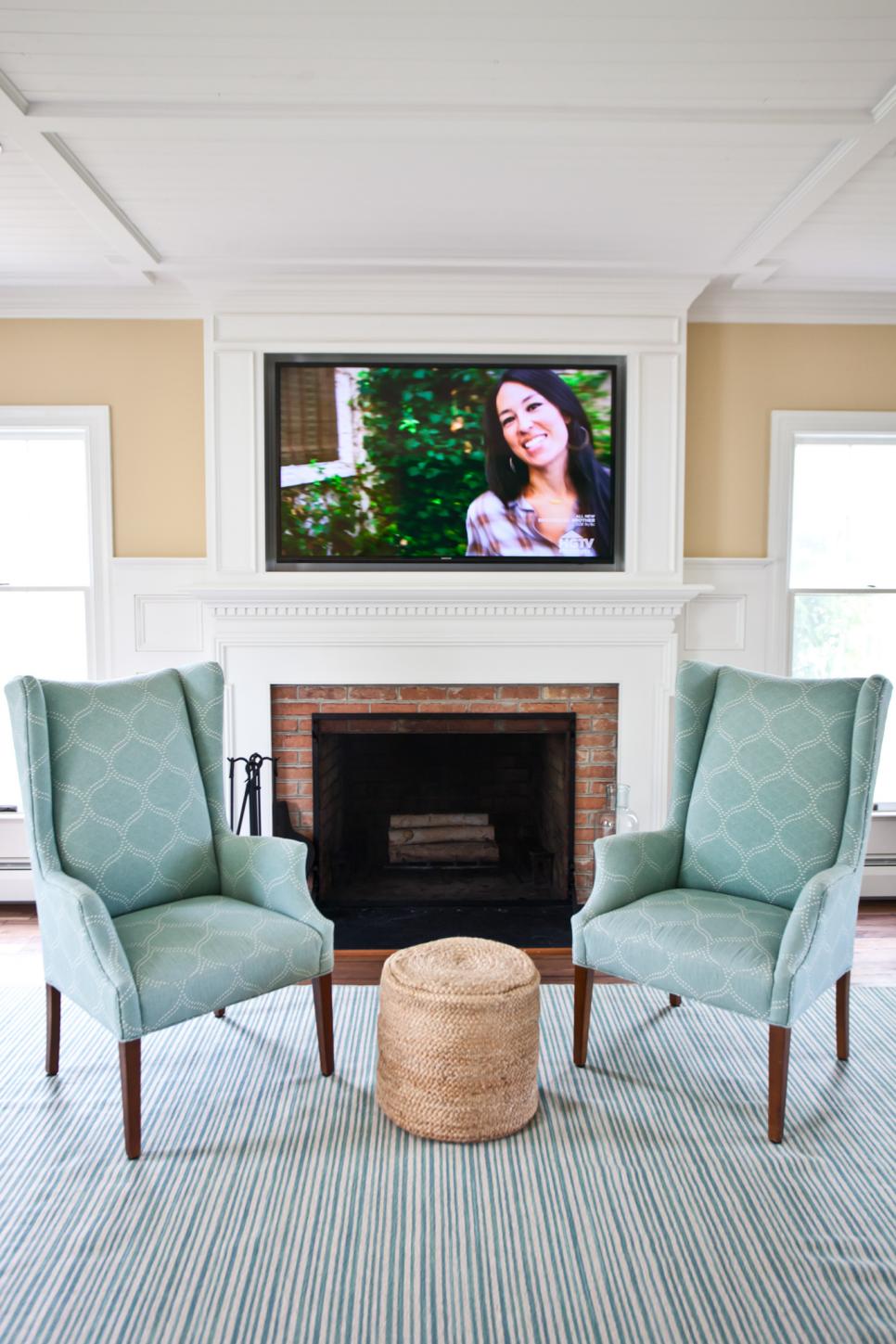 living coastal hgtv cozy inspired inviting fireplace chairs skd studios