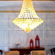 Elegant Chandelier in Eclectic Dining Room