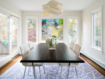 Neutral Contemporary Dining Room With Dark Wood Table & Lilac Rug