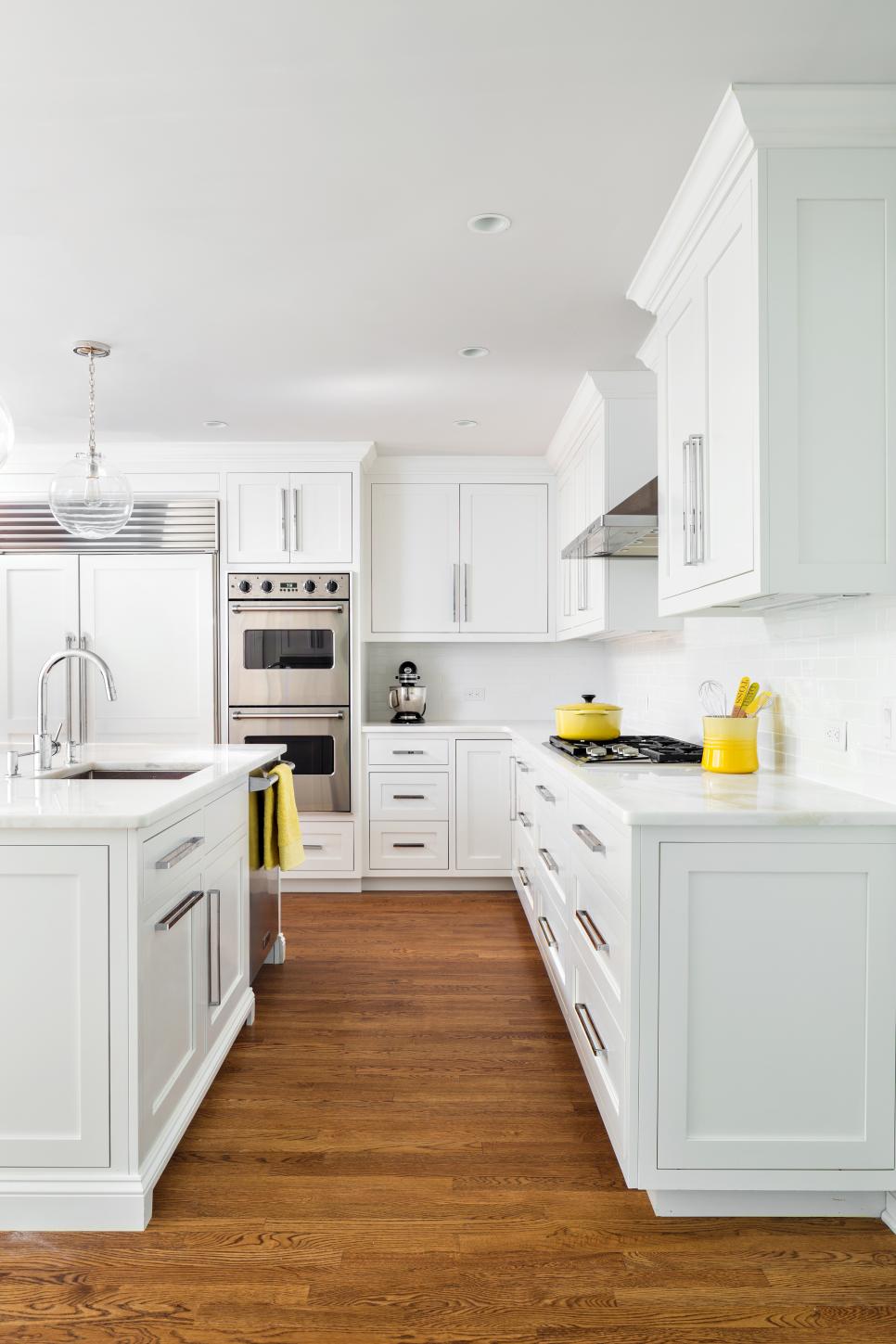 All-White Kitchen With Contemporary Lighting | HGTV