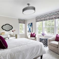 Contemporary Guest Bedroom with Pops of Plum