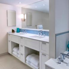 Contemporary Neutral Bathroom With Bright Pops of Blue
