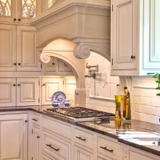 White Traditional Range Hood and Cooktop