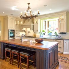 Traditional Neutral Kitchen With Brown Island