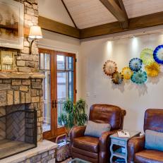 Neutral Sitting Room With Stone Fireplace 