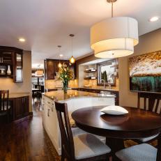Brown Contemporary Kitchen With Round Dining Table