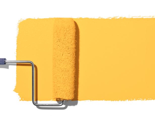 yellow paint and roller