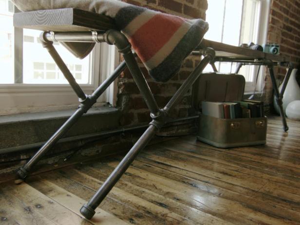 Make an industrial-style bench using only two materials - galvanized pipes and a wood board.