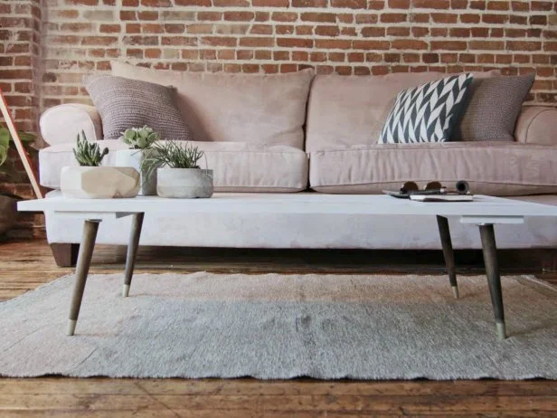 Make a midcentury modern-style coffee table lumber and tapered furniture legs.