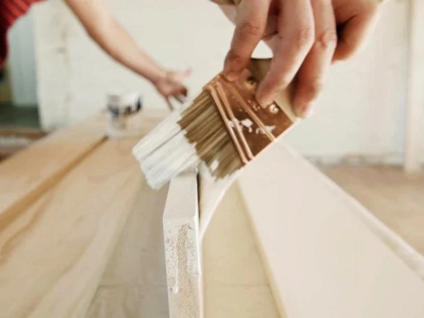 Make a midcentury modern-style coffee table lumber and tapered furniture legs.