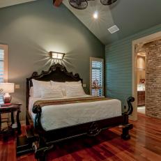 Traditional Blue Bedroom With Elegant Dark Wood Bed