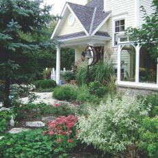 White Cape Cod Exterior and Cottage Garden