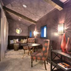 Sconces Dazzle in Contemporary Lavender Sitting Room