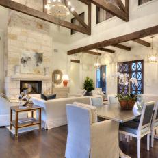 Stunning Great Room Features Exposed Beams & Stone Fireplace