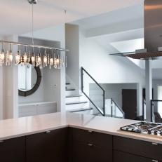 White Countertops in High-Contrast Kitchen