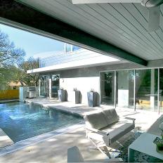 Modern Covered Patio by Swimming Pool