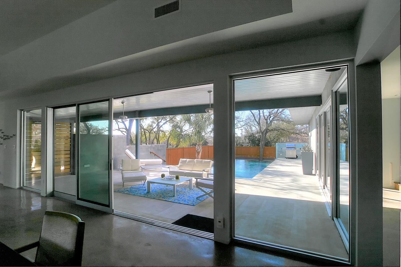 Sliding Glass Door Leads To Modern Covered Patio Hgtv