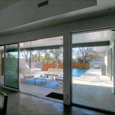 Sliding Glass Door Leads to Modern Covered Patio