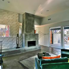 Modern Sitting Room Features Concrete Fireplace & Floor