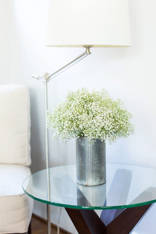 White Floral Centerpiece in Metal Vase