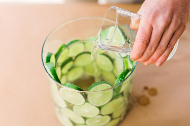 Water is important to keep the flowers and the fruit wheels hydrated. Use a glass filled with water to fill the innermost vessel approximately 2/3 full and the outermost vessel up to the center. You’ll add more water to the outermost vessel once the bouquet has been added and adjusted.