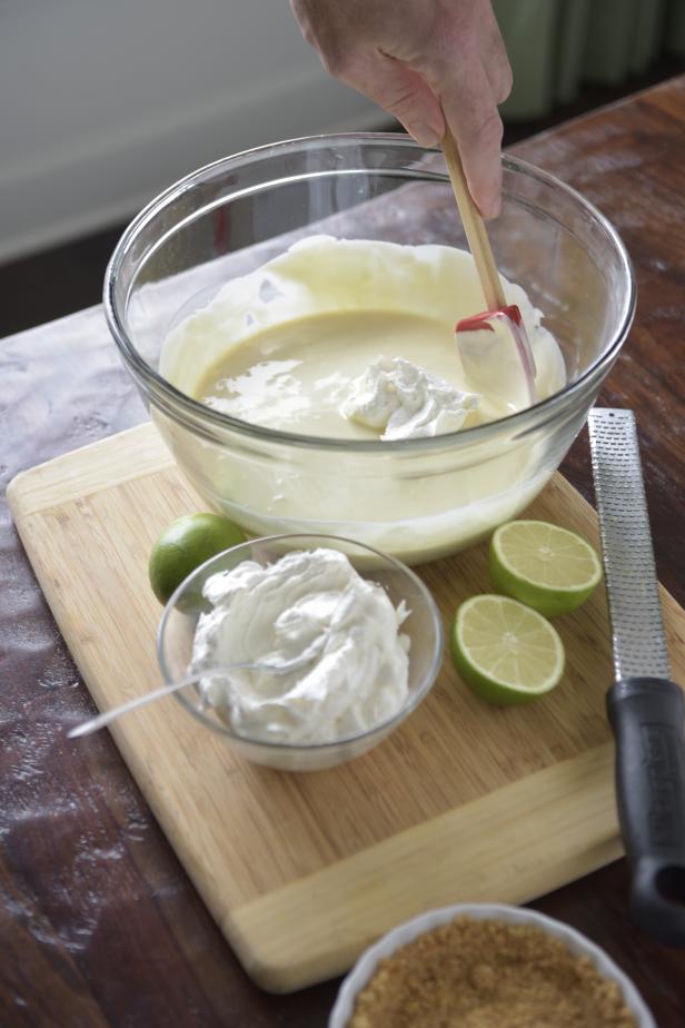 To make the filling, combine the lime juice, whipped topping and food coloring in a small bowl.