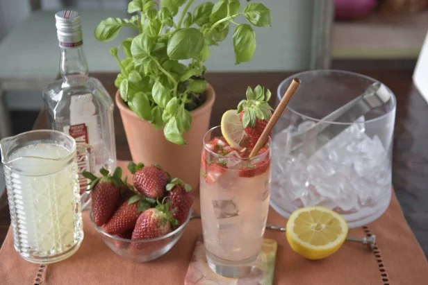 Spring Cocktail With Strawberries, Lemon & Mint Leaves