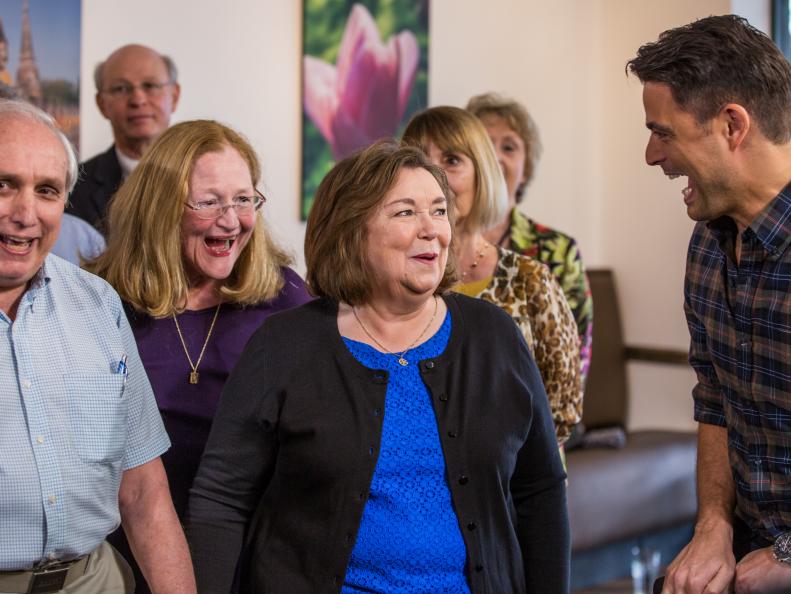 HGTV Host, John Gidding, surprises Katherine O'Dell, winner of the HGTV Dream Home 2015, in Huntsville, Alabama, on Friday, March 20. The grand prize features an approximately 3,200-square-foot residence and all its furnishings on Martha's Vineyard, a 2015 GMC Acadia Denali and a $250,000 cash prize provided by national mortgage lender Quicken Loans.