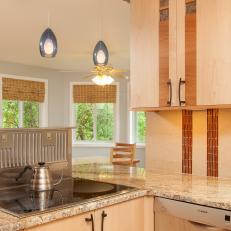 Cooktop and Neutral Kitchen Cabinets
