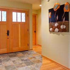 Neutral Foyer With Wood Double Door