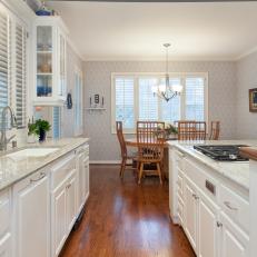 Traditional Colonial Kitchen With Dining Area